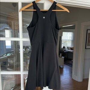 Chic Black Mini Dress with Sleek Silhouette